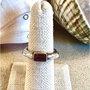 Pink Tourmaline set in 14 Karat Gold on Sterling Silver Band..Cool band design;)